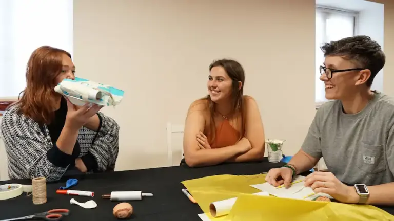 Four Quarters Team Challenge group doing crafts