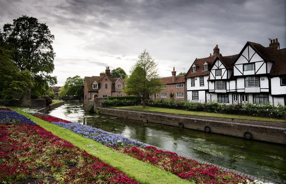 cityscape of canterbury kent uk and canal of river