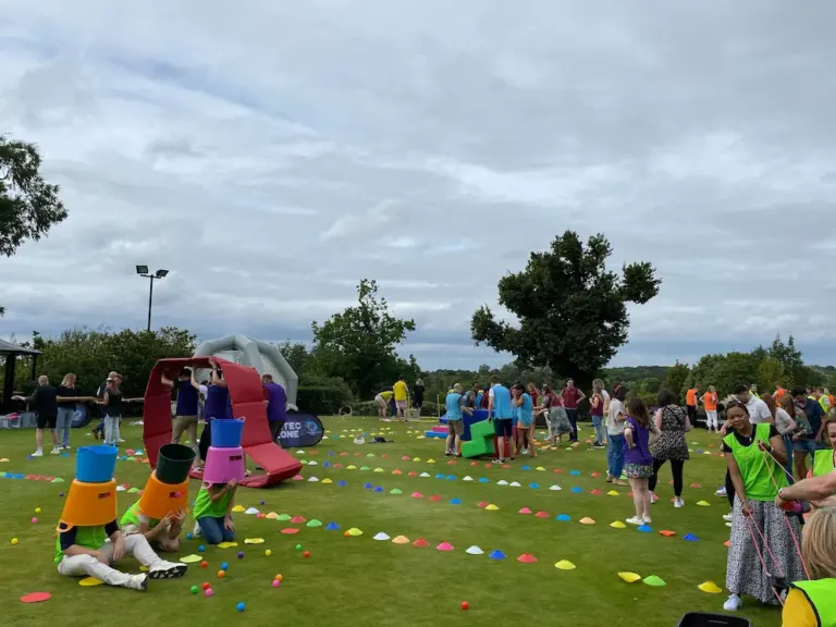 company away day people participating in team building event